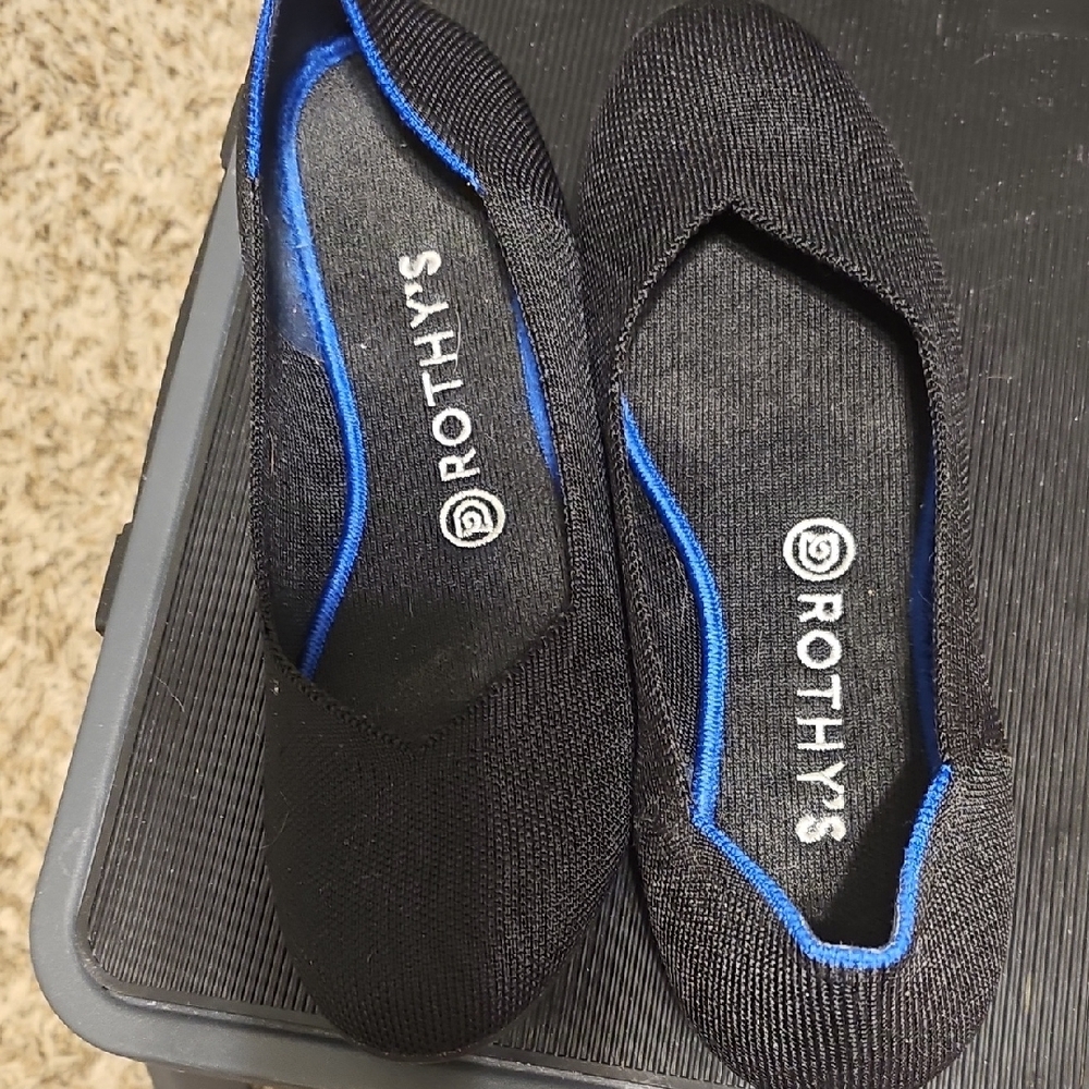 Rothy's Elegant Black Flats with Blue Trim